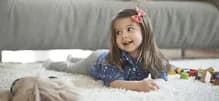 girl leaning on the bed