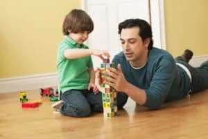 father playing with his son