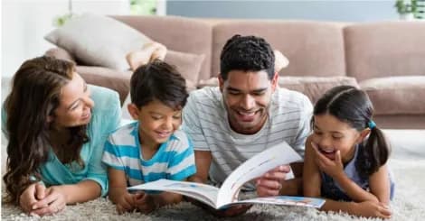 family reading a book