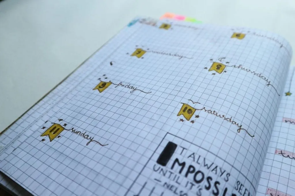Hand-drawn weekly planner showing the days of the week