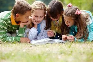 children reading a book